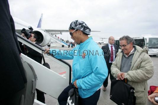 Ronaldinho, boarding the aeroplane to Glasgow.