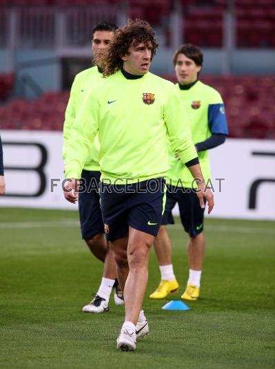 Puyol, absent contra el Valncia per unes molsties a l'esquena, s'ha exercitat amb els seus companys. Foto. Miguel Ruiz - FCB.