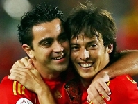 Xavi and Messi on target
