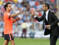 Xavi y Guardiola, premiados con la medalla de oro al Mrito Deportivo. Fotos: arxiu FCB.