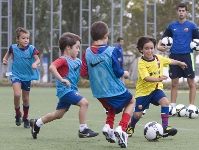 Jugadores de la Escola de Tecnificacin, en una de las sesiones de trabajo. Fotos: archivo FCB.