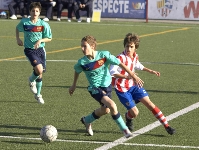 Un instante del partido entre el Vilassar de Mar y el Infantil B del Bara. Fotos: archivo FCB/Severino Fernndez Sainz.