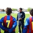 Un equip del FCB Jniors Lujn escoltant les ordres de l'entrenador.