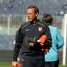 Johan Neeskens giving out bibs before an exercise.